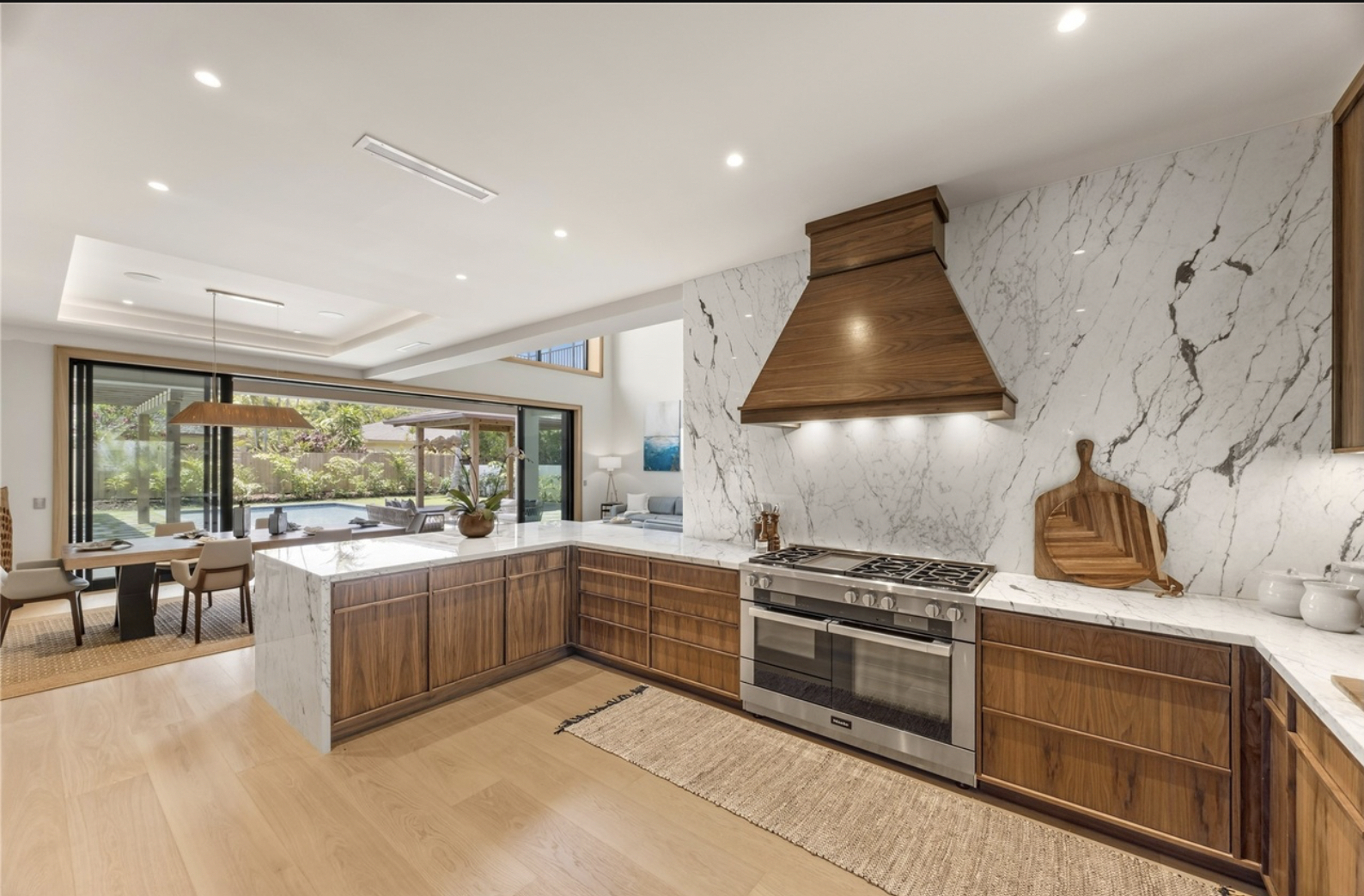 Luxury home kitchen with pool the rich barely use